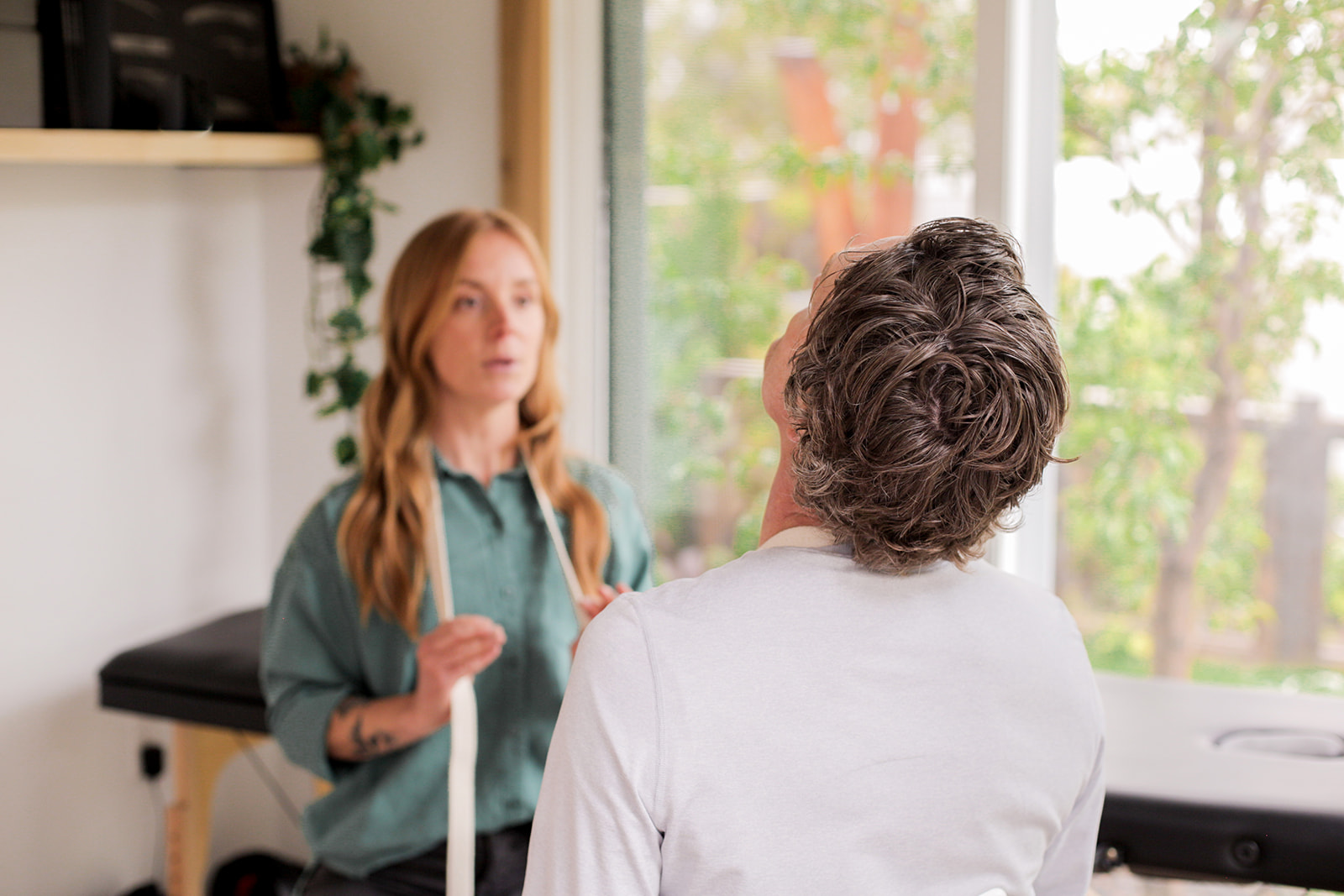 Dr. Emily Warren talking with a patient during an individual MMPT visit